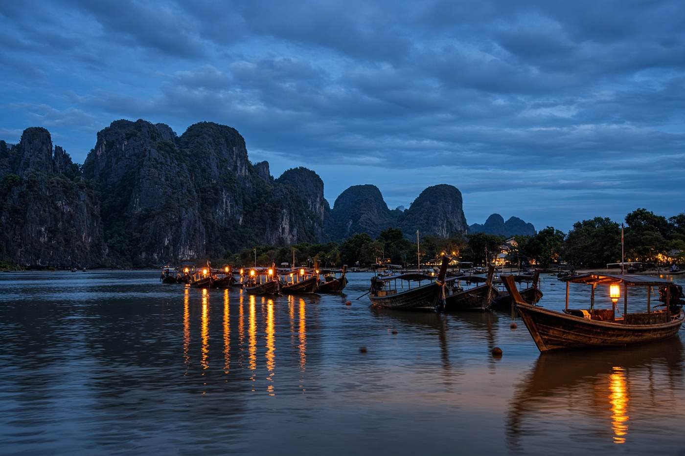 Longtail boats on a tropical beach in Thailand