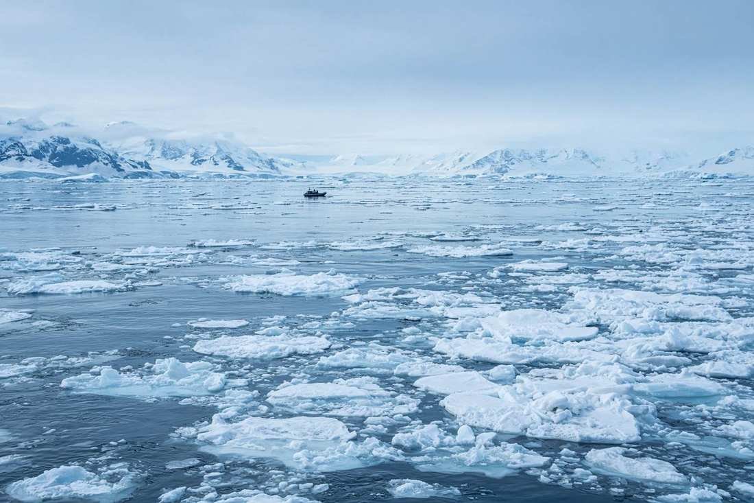 Sea ice under pale polar light