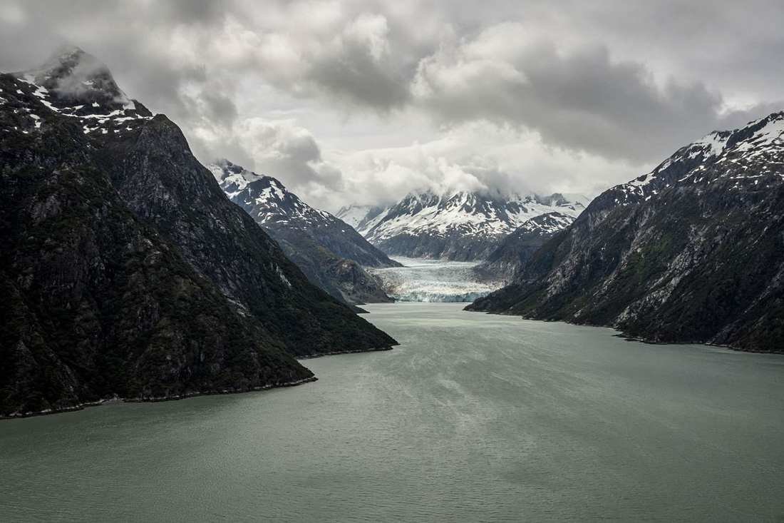 A Patagonian fjord with a distant glacier